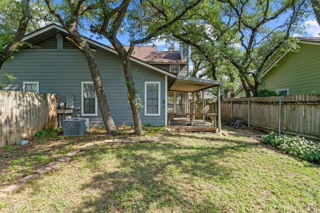 8805 Clearbrook Trl Unit A, Austin, TX 78729 - rear view of property featuring central air condition unit