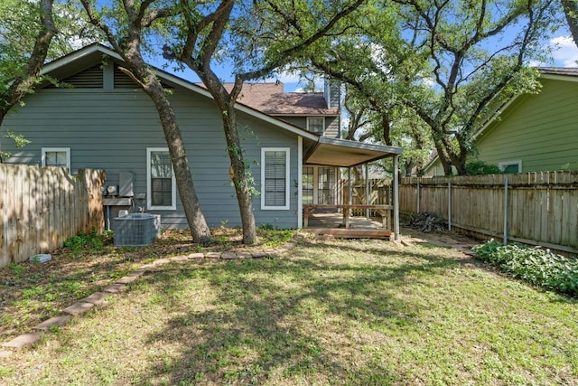 8805 Clearbrook Trl Unit A, Austin, TX 78729 - back of house featuring a fenced backyard