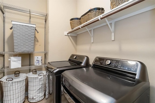 laundry room with separate washer and dryer