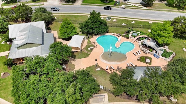 drone / aerial view of a pool