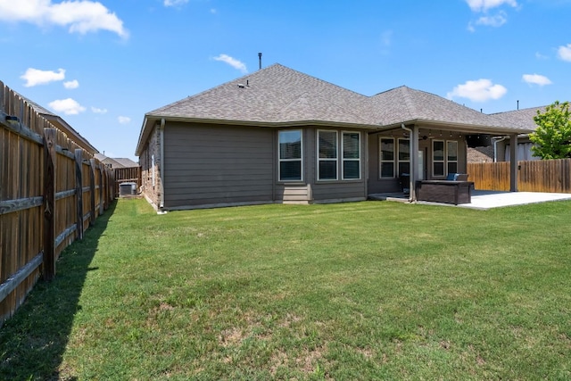12709 Twisted Root Dr, Manchaca, TX 78652 - rear view of property with a patio area and a shingled roof