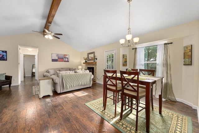 1403 Mills Meadow Dr, Round Rock, TX 78664 - dining space with a chandelier, a fireplace, and dark wood-style floors