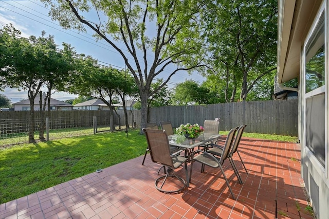 1403 Mills Meadow Dr, Round Rock, TX 78664 - fenced backyard featuring a patio area and outdoor dining space