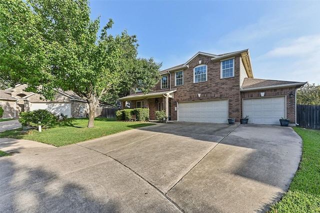 201 Tulip Trail Bnd, Cedar Park, TX 78613 - traditional-style home featuring driveway, brick siding, and a garage