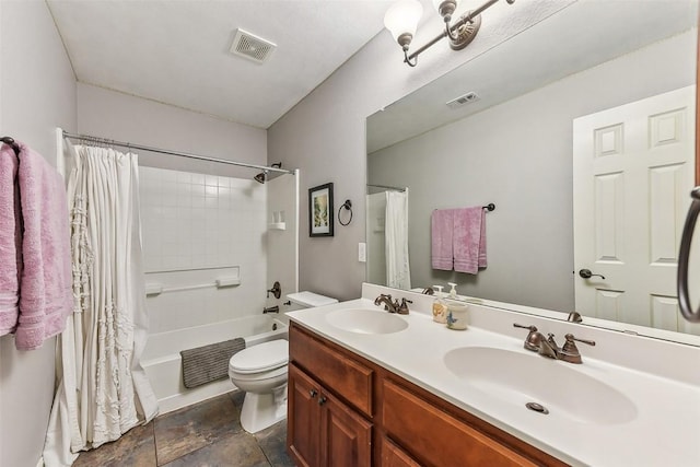 201 Tulip Trail Bnd, Cedar Park, TX 78613 - bathroom with toilet, shower / bath combo with shower curtain, and double vanity