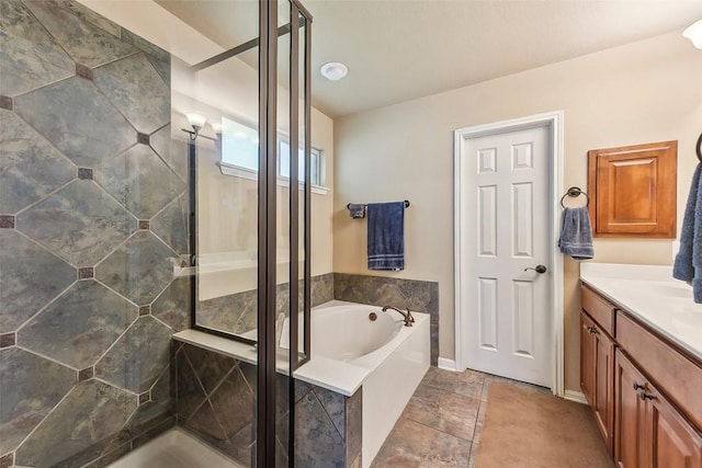 201 Tulip Trail Bnd, Cedar Park, TX 78613 - bathroom featuring a shower stall, vanity, a garden tub, and baseboards