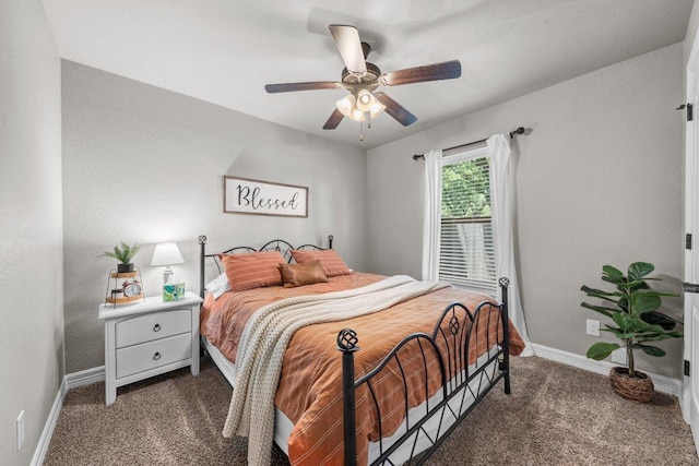 bedroom with carpet floors, baseboards, and ceiling fan