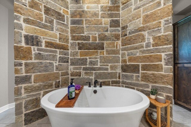 bathroom featuring a freestanding tub