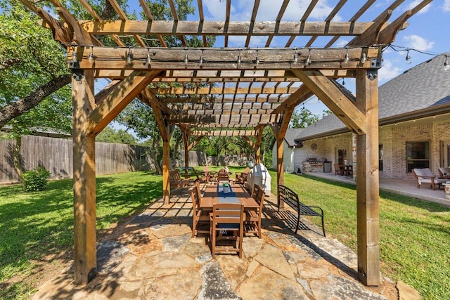 view of patio / terrace featuring a pergola and outdoor dining space