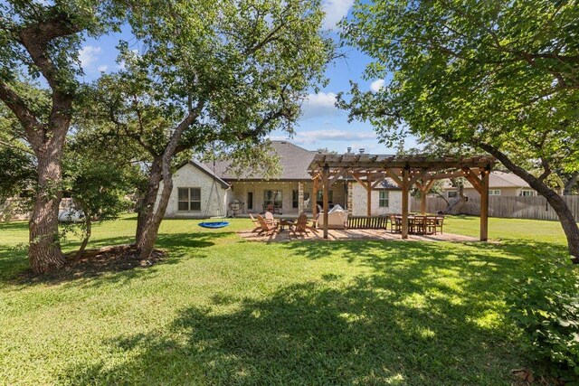 26 Riverstone Pkwy, Belton, TX 76513 - rear view of house with a pergola and a patio