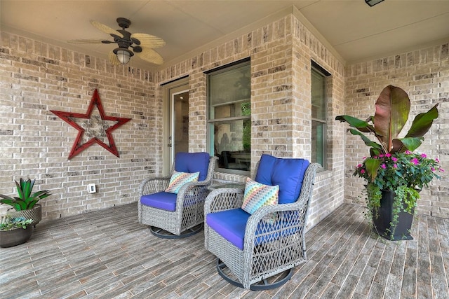 wooden deck with ceiling fan