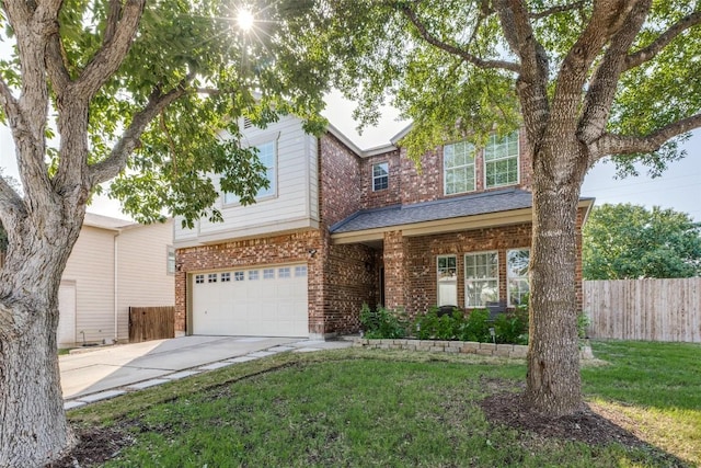 490 Holly Grove St, Kyle, TX 78640 - view of front of house featuring concrete driveway, an attached garage, and brick siding
