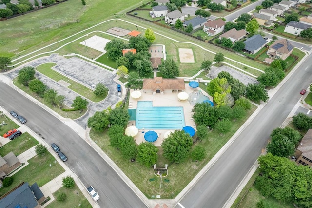 490 Holly Grove St, Kyle, TX 78640 - aerial perspective of suburban area with a pool
