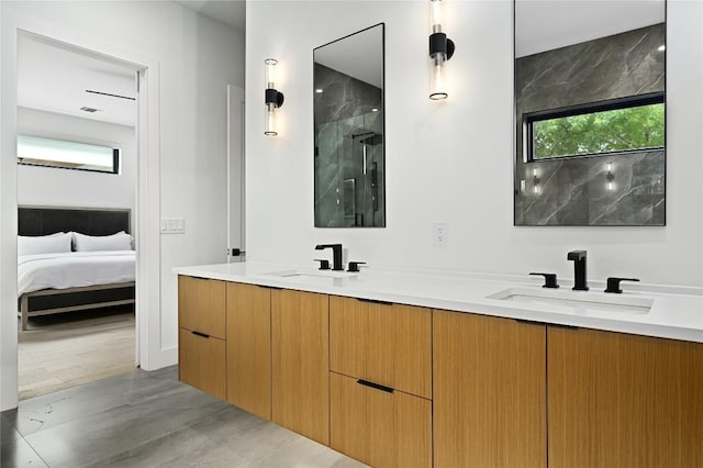 3305 Skylark Dr, Austin, TX 78757 - ensuite bathroom with a shower with shower door and double vanity