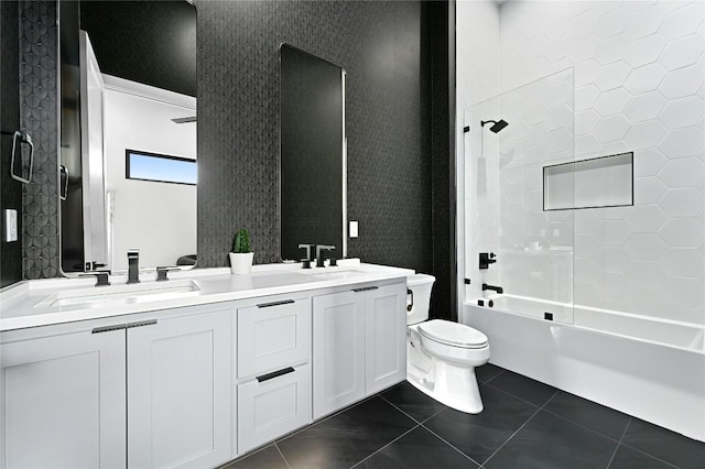 3305 Skylark Dr, Austin, TX 78757 - full bathroom featuring toilet, double vanity,  shower combination, and tile patterned flooring