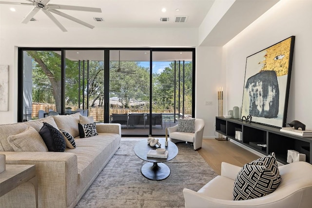 2502 Barhill Dr, Austin, TX 78704 - living room with ceiling fan, wood finished floors, and recessed lighting