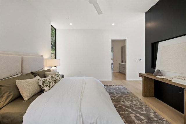 2502 Barhill Dr, Austin, TX 78704 - bedroom with light wood finished floors and recessed lighting