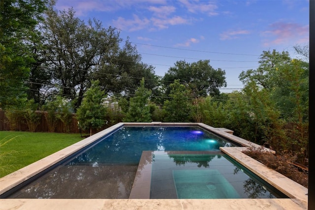 2502 Barhill Dr, Austin, TX 78704 - view of pool with a fenced backyard and a pool with connected hot tub