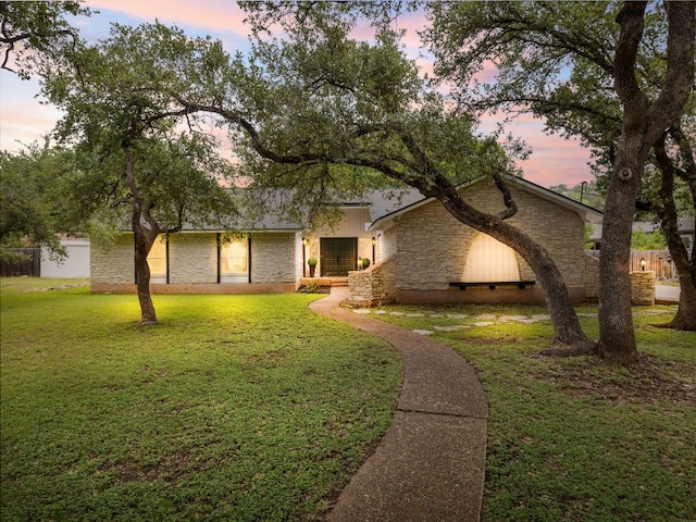504 Ridgecrest Rd, Georgetown, TX 78628 - mid-century modern home featuring stone siding and a yard