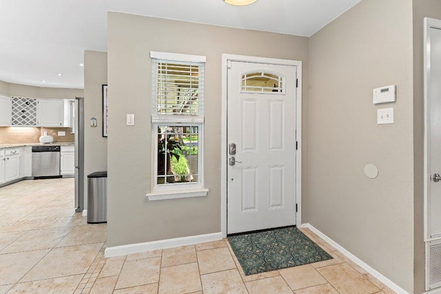4806 Transit Cir, Austin, TX 78727 - entryway featuring baseboards and recessed lighting