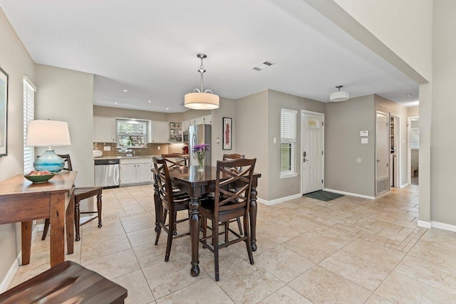 4806 Transit Cir, Austin, TX 78727 - dining area featuring baseboards and recessed lighting