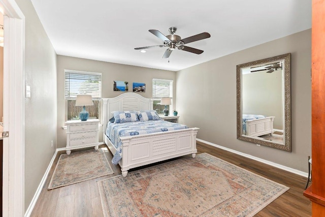 4806 Transit Cir, Austin, TX 78727 - bedroom with wood finished floors, baseboards, and ceiling fan