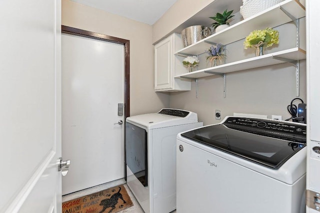 4806 Transit Cir, Austin, TX 78727 - washroom with cabinet space and separate washer and dryer