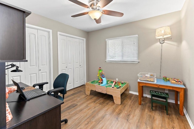 4806 Transit Cir, Austin, TX 78727 - office area featuring ceiling fan, baseboards, and light wood-style flooring