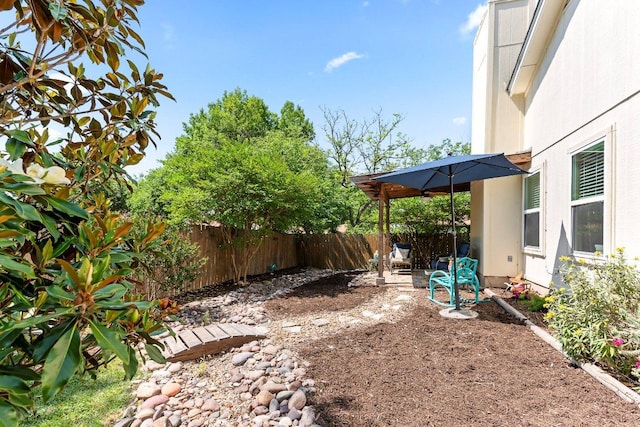 4806 Transit Cir, Austin, TX 78727 - fenced backyard featuring a patio area