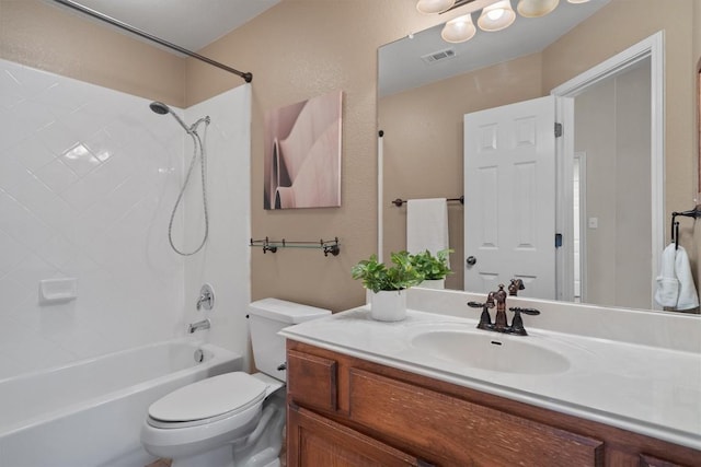full bathroom with toilet, vanity, and shower / tub combination