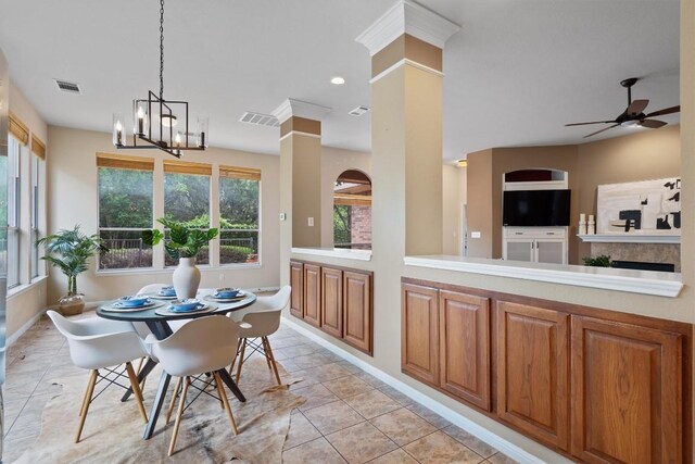 dining area with a ceiling fan, a chandelier, light tile patterned flooring, decorative columns, and recessed lighting