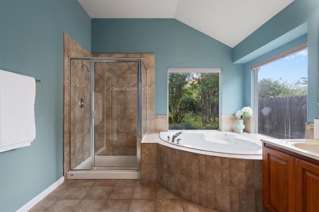 full bath featuring a stall shower, a bath, tile patterned flooring, lofted ceiling, and vanity
