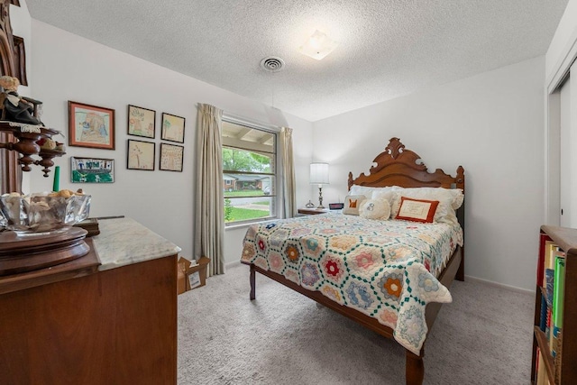 3108 W Terrace Dr, Austin, TX 78757 - bedroom with light carpet and a textured ceiling