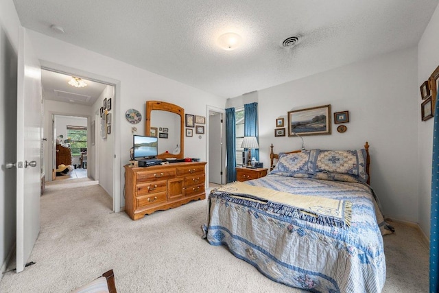 3108 W Terrace Dr, Austin, TX 78757 - bedroom featuring carpet flooring and a textured ceiling