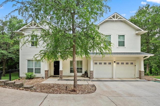 18 N Peak Rd, West Lake Hills, TX 78746 - craftsman house with driveway, a garage, and fence