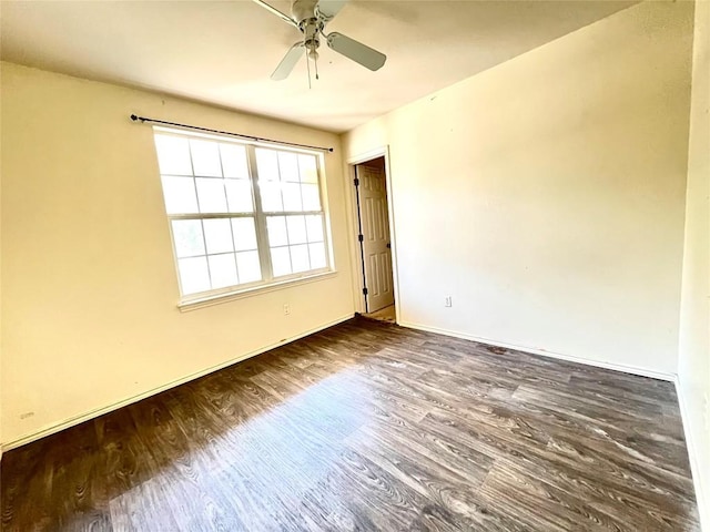 11729 Timber Heights Dr, Austin, TX 78754 - empty room with wood finished floors and a ceiling fan