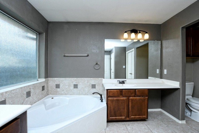 15628 Interlachen Dr, Austin, TX 78717 - bathroom featuring vanity, a garden tub, and tile patterned flooring