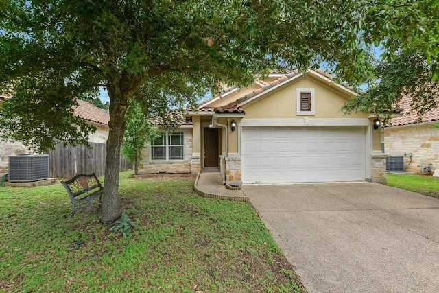 15628 Interlachen Dr, Austin, TX 78717 - view of front of property featuring stone siding, concrete driveway, a garage, and stucco siding