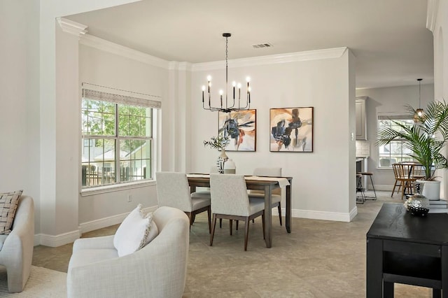 dining area with a chandelier, plenty of natural light, ornamental molding, and baseboards
