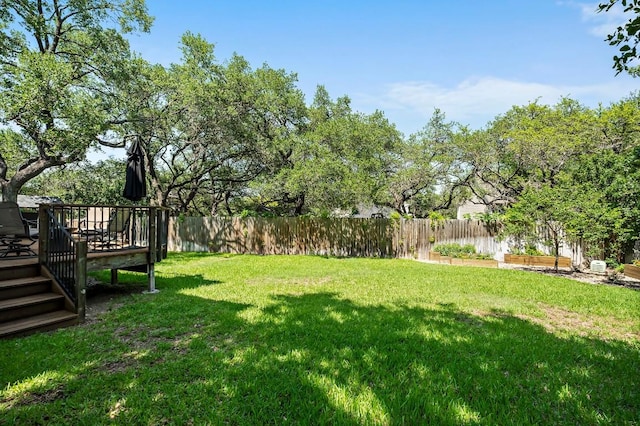 view of yard featuring a deck