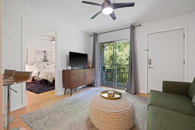3204 Menchaca Rd Unit 716, Austin, TX 78704 - living area with a ceiling fan and wood finished floors