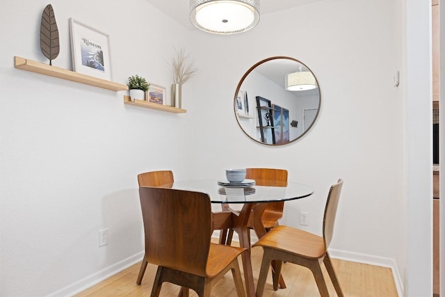 3204 Menchaca Rd Unit 716, Austin, TX 78704 - dining space with light wood-style floors and baseboards