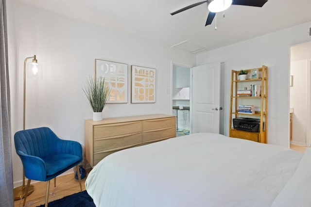 3204 Menchaca Rd Unit 716, Austin, TX 78704 - bedroom with attic access, wood finished floors, and ceiling fan