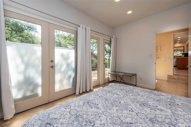 doorway to outside with french doors, recessed lighting, tile patterned flooring, and baseboards