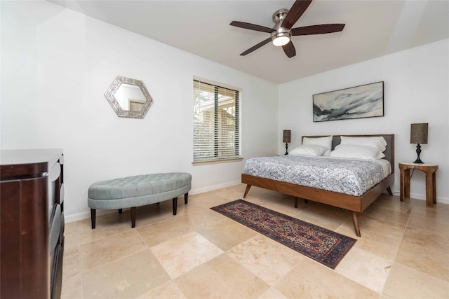 bedroom with baseboards and ceiling fan