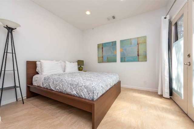bedroom featuring baseboards, recessed lighting, and light tile patterned flooring