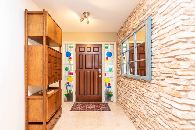 foyer with tile patterned flooring