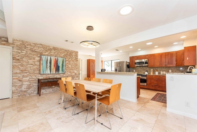 dining area with recessed lighting