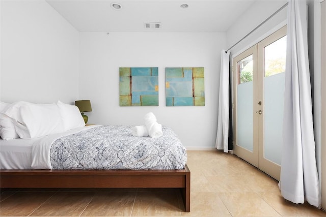 11532 Spicewood Pkwy, Austin, TX 78750 - bedroom featuring access to outside, french doors, and recessed lighting