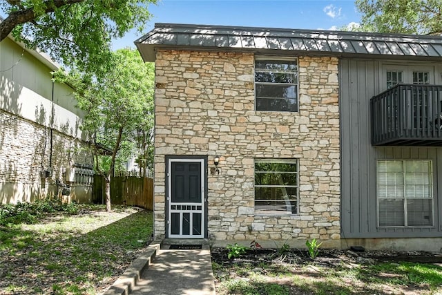 1912 Lightsey Rd Unit 1, Austin, TX 78704 - view of front of house featuring stone siding and a balcony